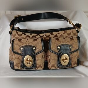 Coach legacy double turn lock